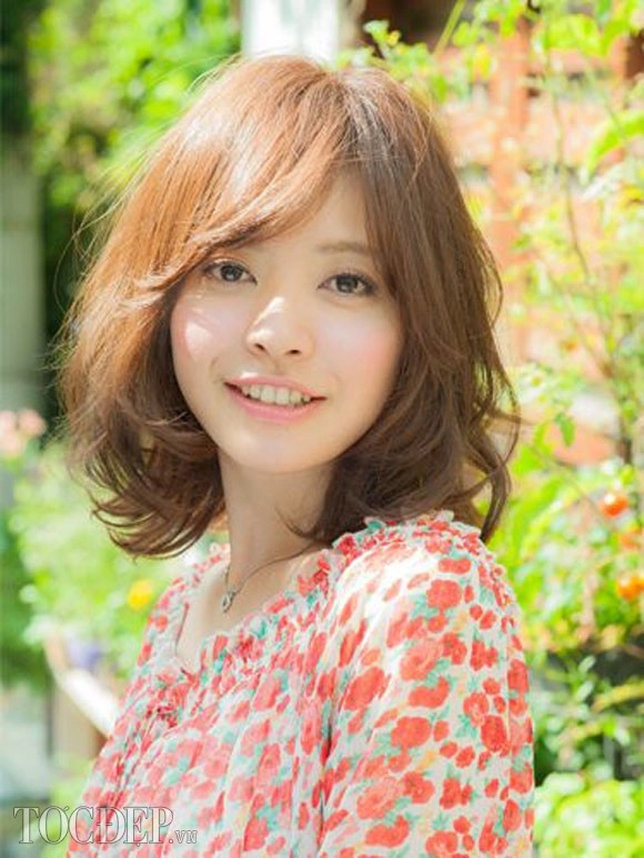 Tóc xoăn đánh rối bồng bềnh cho mái tóc quý cô